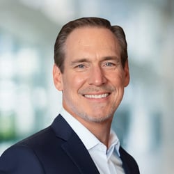 Neil Bryson_Beeline_Headshot Standing_2025