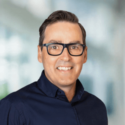 Paddy Benson_Square_Beeline Headshot_2025 2