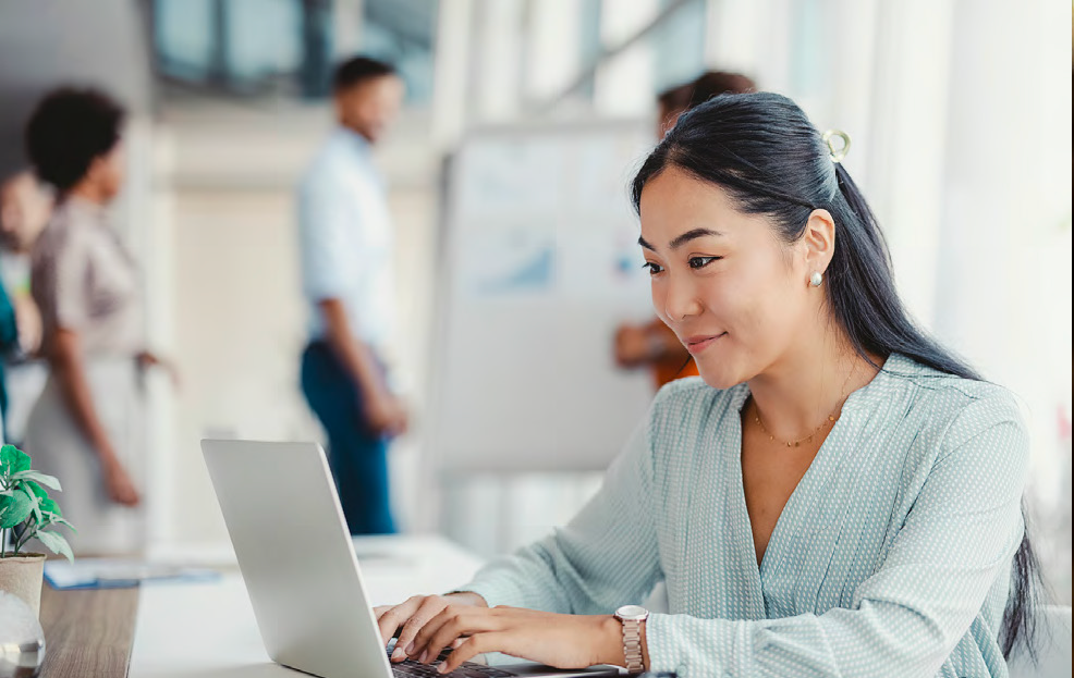 Tech woman working on a laptop