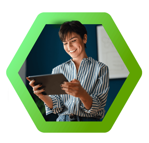 Woman smiling and holding iPad