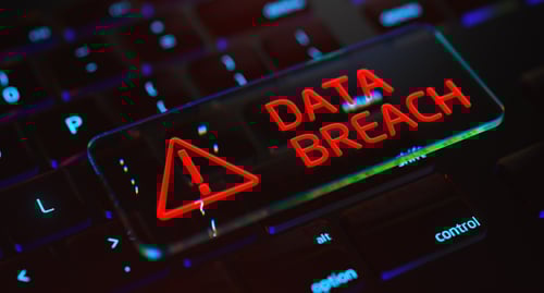 data breach words written on computer screen